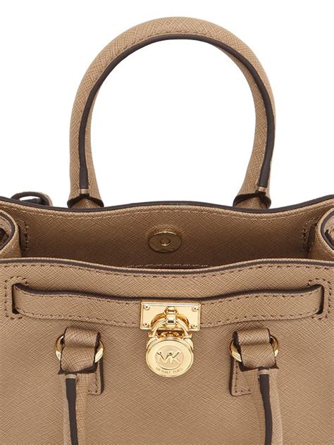 do michael kors purses have warranty|michael kors contact customer service.